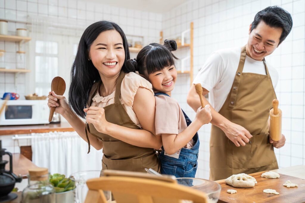 Happy family in a kitchen baking