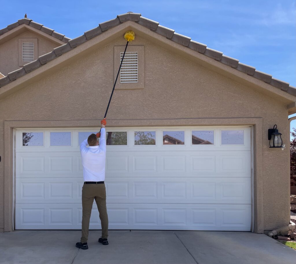 Pest control expert inspecting a home